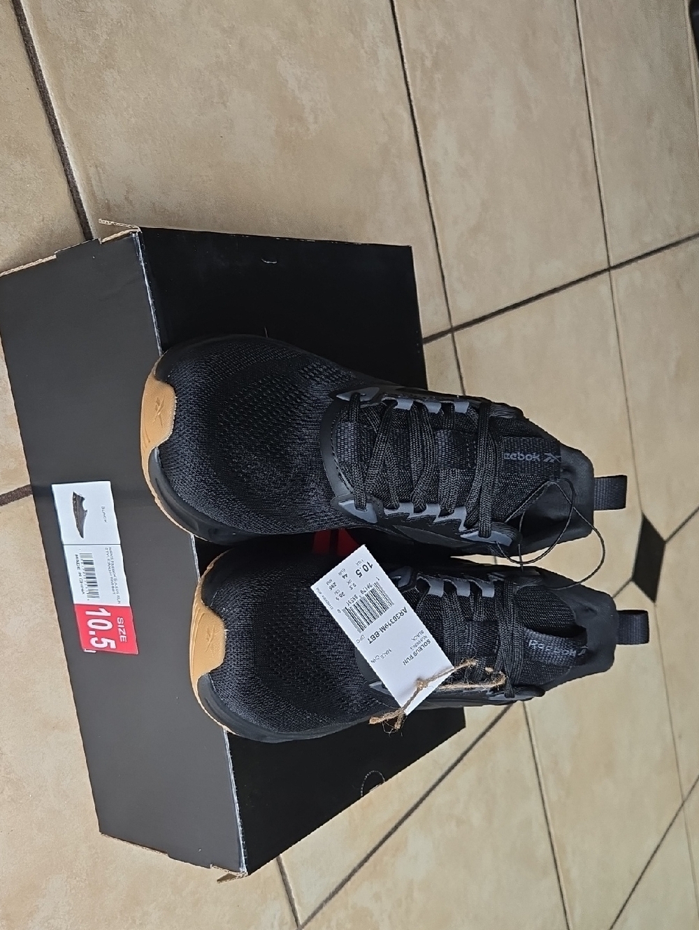 Reebok Men’s Black Athletic Shoes with Gum Toe Accent - Soleus Run